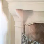 Top left corner view of Bowen cast stone fireplace mantel.