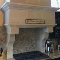 Tuscany cast stone fireplace mantel.