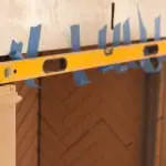 Detailed view of cast stone product installation by Old World Stoneworks