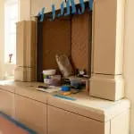 Old World Stoneworks cast stone overmantel installation