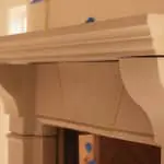 Montgomery model cast stone fireplace mantel by Old World Stoneworks