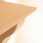 Right corner of fireplace mantel