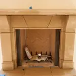 Old World Stoneworks fireplace mantel