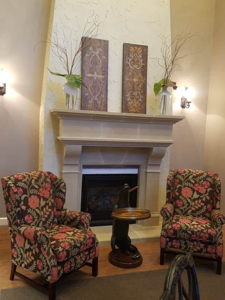 Stunning Brunswick cast stone fireplace mantel in a customer's living room.