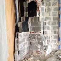 Amhurst cast stone fireplace mantel installation
