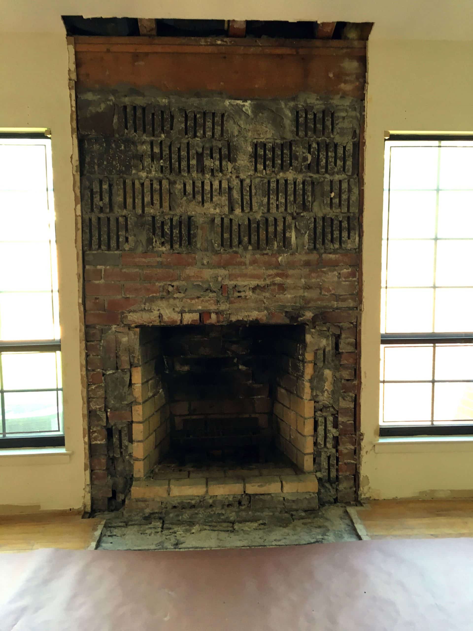 Cast stone fireplace mantel image before full installation