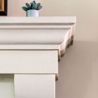 Detailed craftsmanship on cast stone overmantel