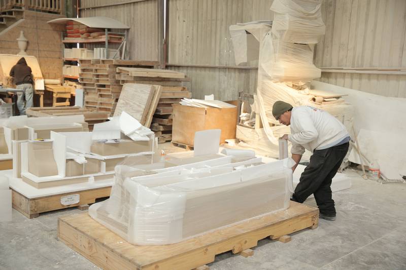 Stones are wrapped prior to crating