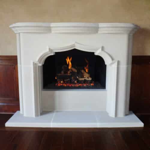 Detailed image of the Avalon cast stone fireplace mantel.