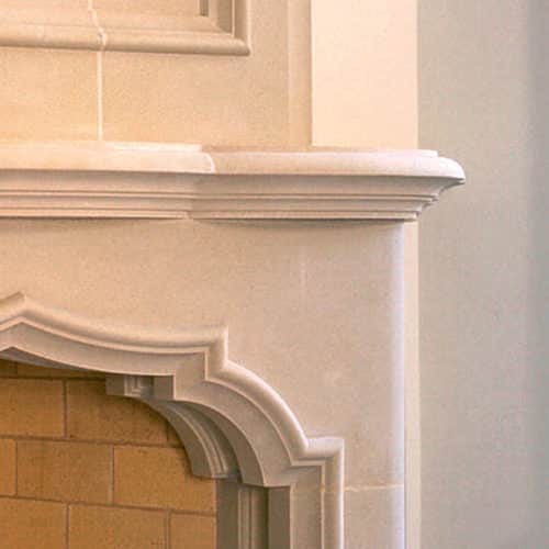 Upper right corner of Avalon cast stone fireplace mantel in a customer's home.