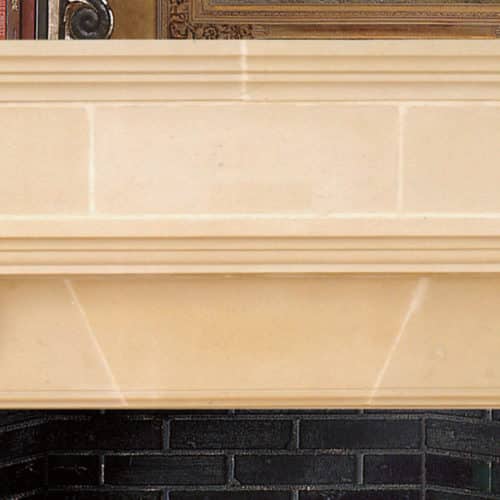 Brunswick cast stone fireplace mantel center detail.