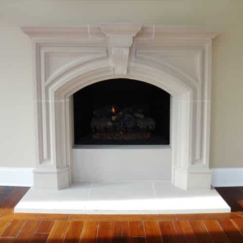 Fremont cast stone fireplace mantel design.