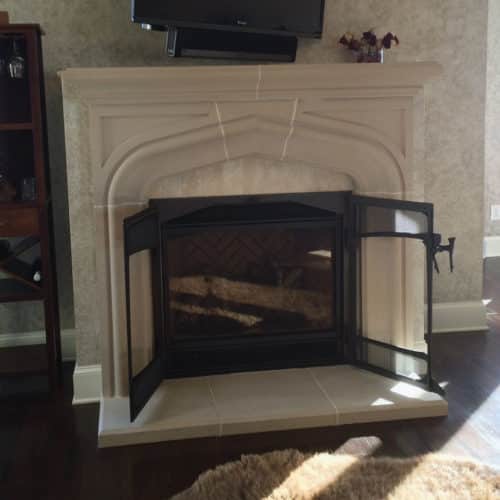 Laurent cast stone fireplace mantel in a customer's home living room.