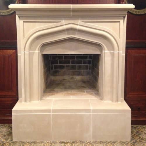 Detailed view of Laurent cast stone fireplace mantel.
