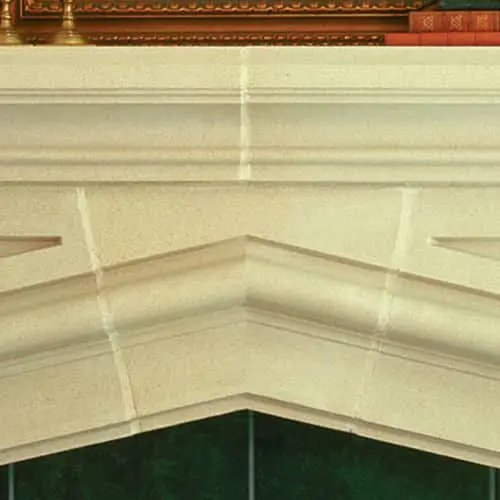 Center detail of the Laurent cast stone fireplace mantel.