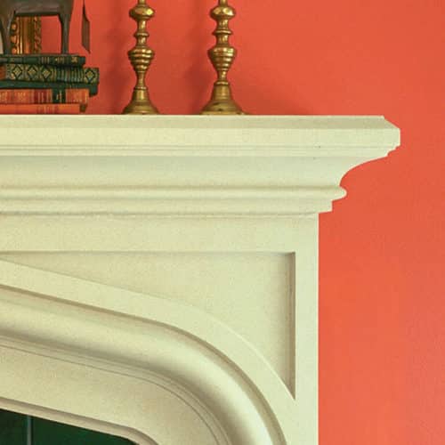 Top right corner detail of Laurent cast stone fireplace mantel.