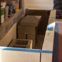 Manhattan blog featuring cast stone fireplace mantel