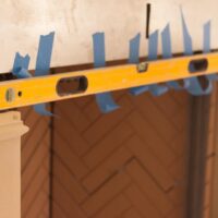 Detailed view of cast stone product installation by Old World Stoneworks