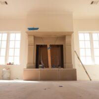 Detailed installation of Old World Stoneworks cast stone mantel