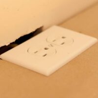 Old World Stoneworks cast stone fireplace mantel close-up