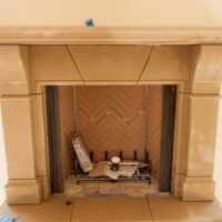 Old World Stoneworks fireplace mantel
