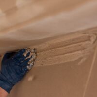 Old World Stoneworks stone fireplace mantel install