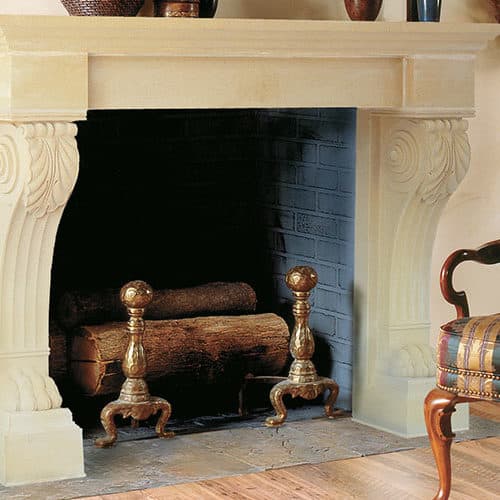 Wellington cast stone fireplace mantel in a home setting.